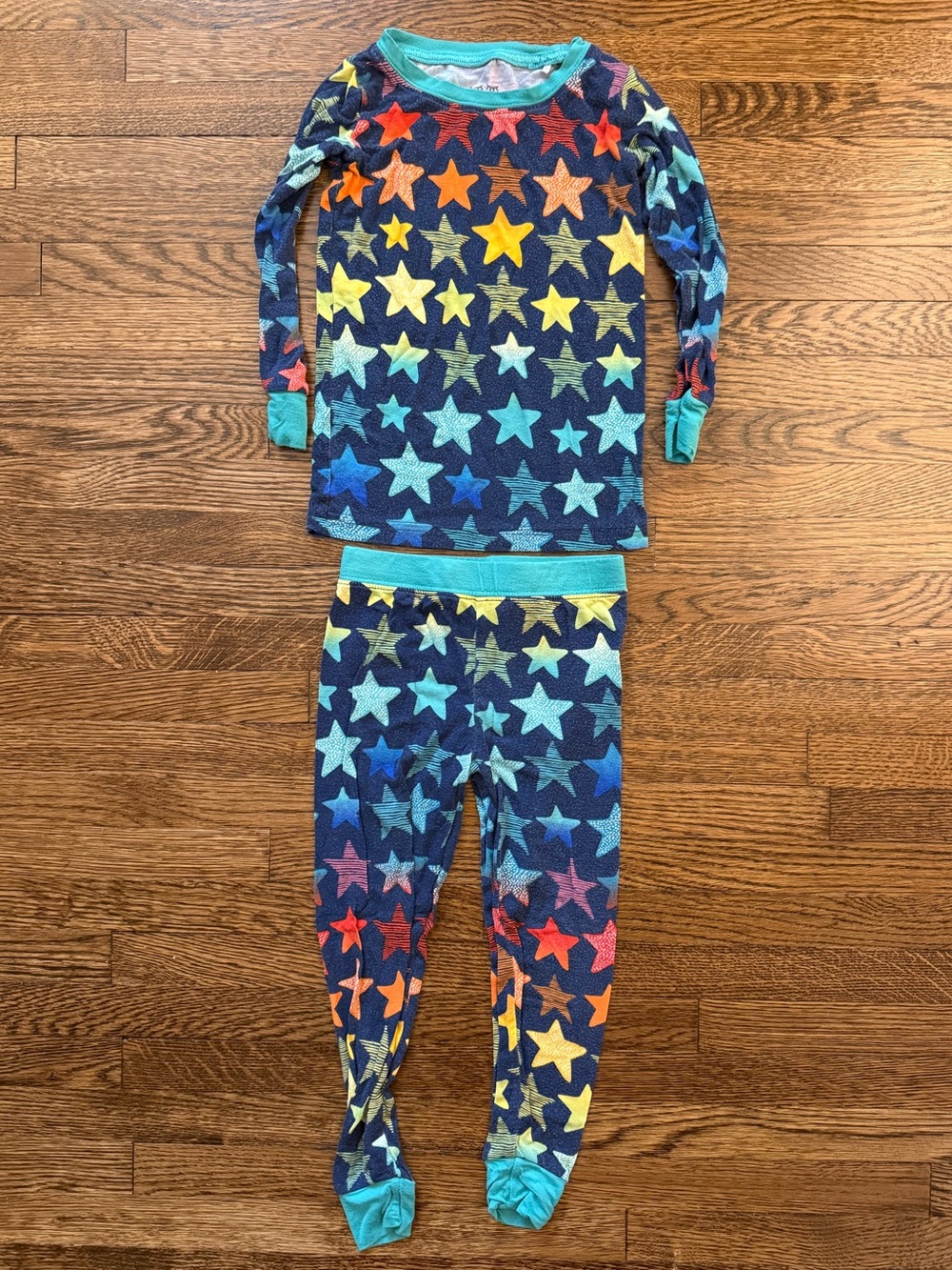 Little Sleepies Navy Pajama Set with Multicolor Stars (yellow, red, blue, teal)
